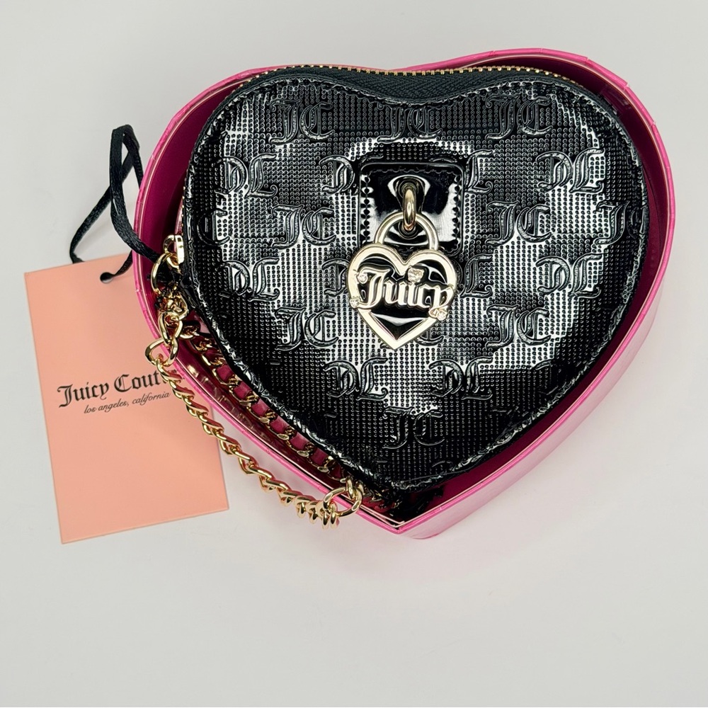 Juicy Couture Black Heart zip around emboss in color black